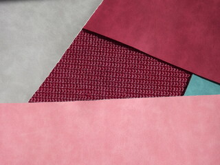 red, burgundy, blue, gray geometric shapes as background