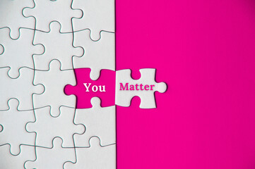 Text on missing jigsaw puzzle - you matter. Conceptual