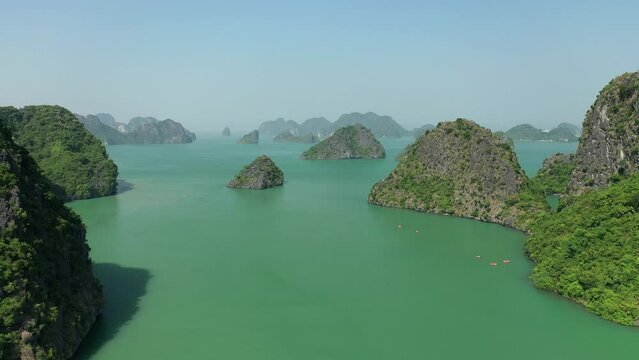 Drone view over halong bay and a kayack excursi&oacute;n on sight