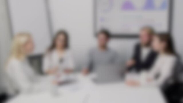 Blurry background of a startup meeting, entrepreneurs meeting to innovate their business at an office