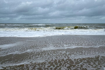 North Sea beach with surf and waves