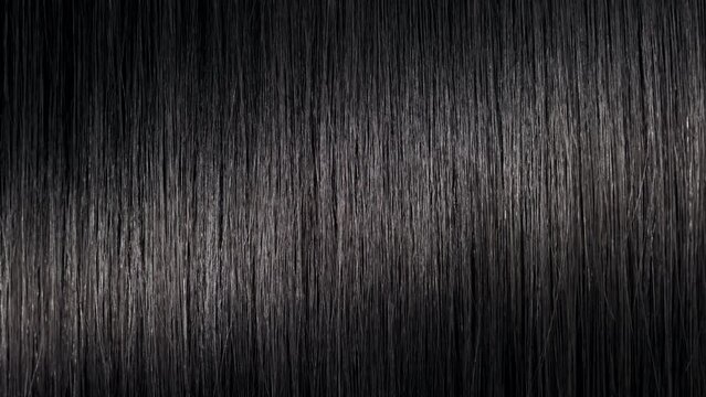 Hair texture | A wave passes through black hair | Hair care concept