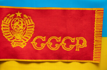 The flag of the USSR is red and the national flag of Ukraine is yellow-blue, back to the past for...