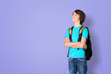 Fototapeta premium Let me think. Caucasian clever schooler with puzzled serious expression, child thinking