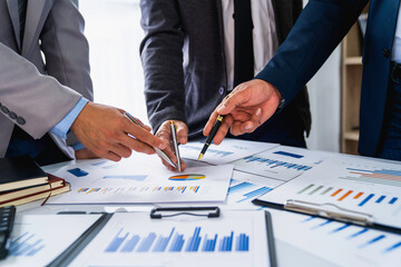 Meeting concept Business team hands at working with financial plan, meeting, discussion, brainstorm with tablet on the office desk