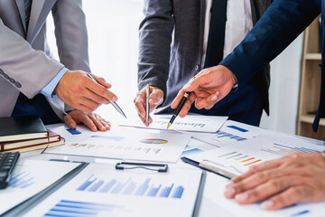 Business team presentation meeting Asian Men Finance Executive discusses meetings to plan work, investment projects, and trading strategy for trading partners. Finance and Accounting
