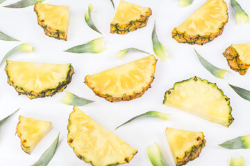single whole pineapple. sliced pineapple in exotic summer fruit design white background top view mock-up.