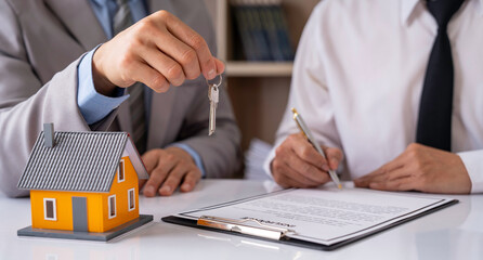 Real estate company to buy houses and land are delivering keys and houses to customers after...