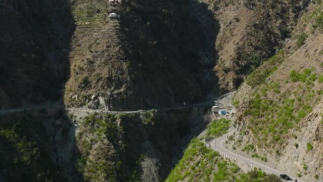 Aerial View Of Winding Road On Mountainside In Swat Valley. Dolly Forward, Pan Right 