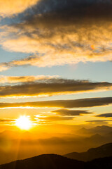 Sunset and wind clouds in La Garrotxa, Girona, Spain