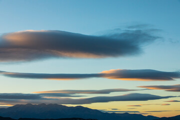 Sunset and wind clouds in La Garrotxa, Girona, Spain