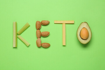 Word Keto made with different products on light green background, flat lay