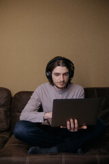 ukrainian man freelancer working with laptop at home