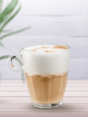 Flat white coffee with milk and coffee powder