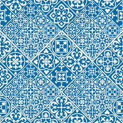 Portuguese seamless pattern with azulejo tiles. Gorgeous seamless patchwork pattern from colorful Moroccan tiles, ornaments