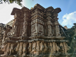 Obraz premium Stock photo of exterior view of ancient Kopeshwar Mahadev temple, Khidrapur, Maharashtra, India.Beautiful carving revealed hindu culture and traditions. Picture captured under bright sunlight .