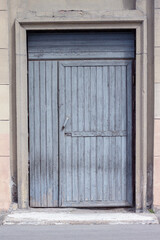 Old wooden door. Of blue color. Double door.