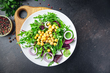 chickpea salad green leaf lettuce petals mix fresh portion healthy meal food diet snack on the table copy space food background keto or paleo diet veggie vegan or vegetarian food no meat