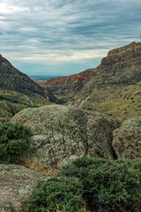 Rocks and cliffs tower over Shell canyon in Wyoming, USA