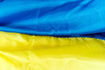 Flag of Ukraine. Close up waving flag symbol of Ukraine. Martial law in Ukraine 2022