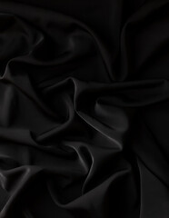 Folds of black silk background, smooth silky satin folds