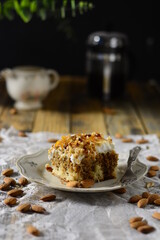 cake with nuts and whipping cream On a wooden table , Crocan cake
