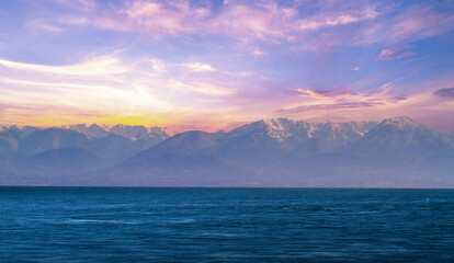 Beautiful view of the sunset in the snow mountains, Vancouver, Canada.