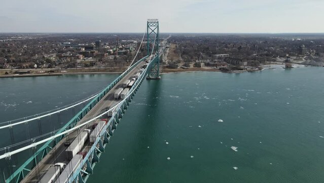 Truckers crossing USA - Canda border over Ambassador bridge in Detroit, aerial view