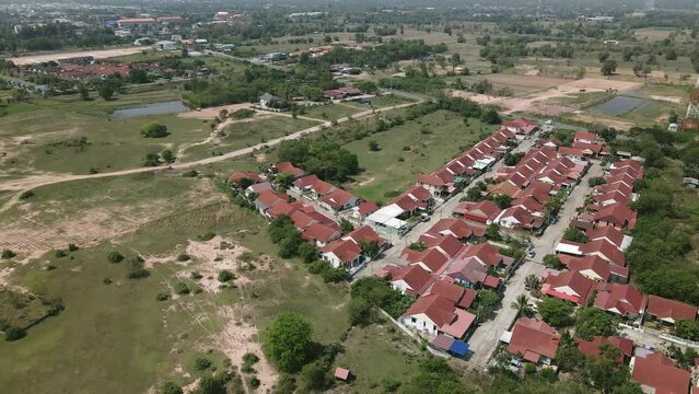 Aerial drone image of residential suburban houses in a small community.
