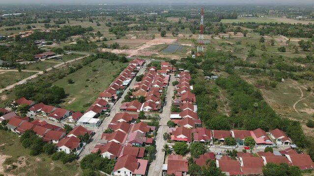 Aerial drone image of residential suburban houses in a small community.