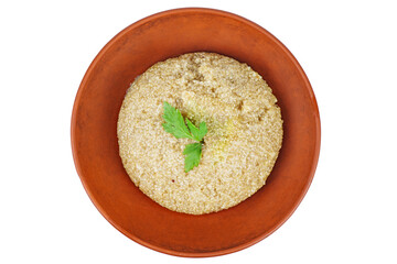 Cooked white quinoa in clay bowl isolated on a white background