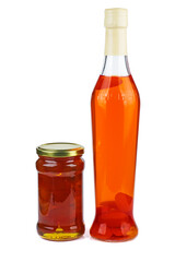 Kumquat liqueur and jam isolated on a white background