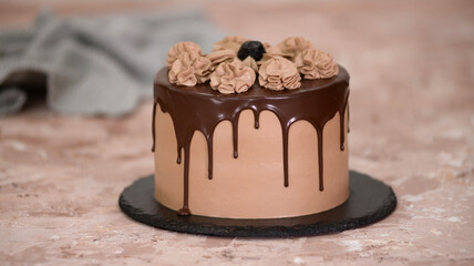 Tasty chocolate cake on table. Chocolate pastries