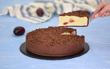Delicious plum cheesecake with chocolate shortcrust pastry.