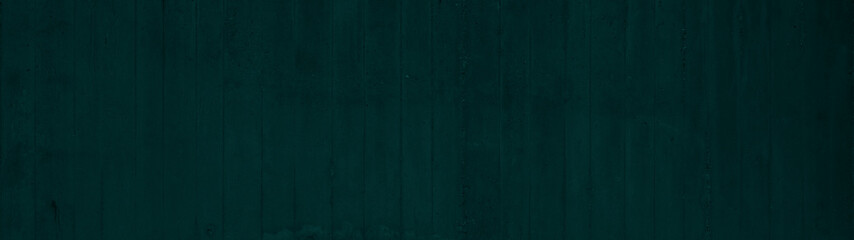 Dark green abstract colored stone concrete wall texture background panorama banner long