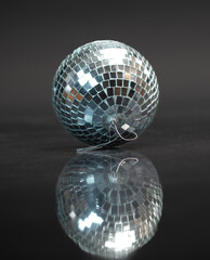 Mirror ball on a black background.