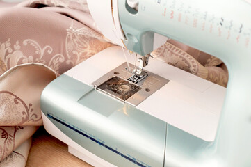 Modern sewing machine. View from above