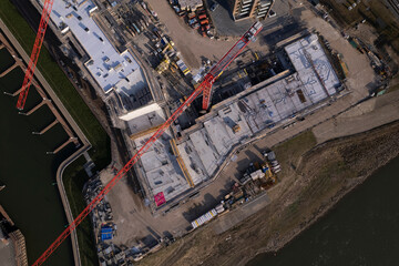 Construction site Kade Zuid part of the new Noorderhaven neighbourhood at river IJssel. Aerial...