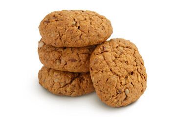 oatmeal cookies with flax, pumpkin and sunflower seeds isolated on white background with clipping path and full depth of field