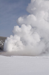Old Faithful in Yellowstone National Park Wyoming in Winter