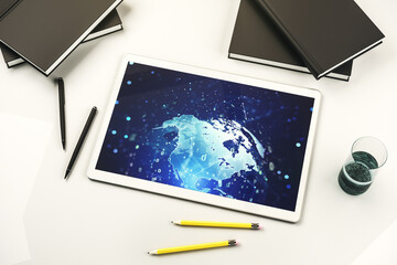 Abstract creative coding illustration with world map on modern digital tablet display, international software development concept. Top view. 3D Rendering