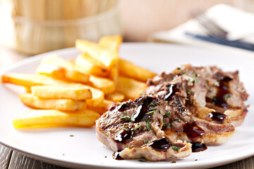 Grilled lamb chops with french fries. High quality photo