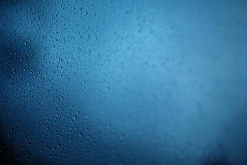drops of body on glass. fogged glass. small drops of water on the glass