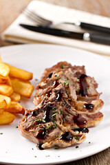Grilled lamb chops with french fries. High quality photo