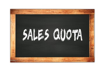 Obraz premium SALES QUOTA text written on wooden frame school blackboard.