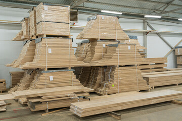 oak furniture boards in the warehouse of woodworking production
