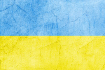 Flag of Ukraine painted on a concrete  broken wall.  Crisis in international relations, Russian military invasion of Ukraine