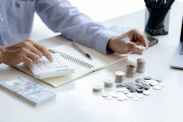 Stacks of coins arranged in a row from low to high, analogous to the growth of money, investing in stocks, stock market chart graphics showing stock trading. The idea of investing money.