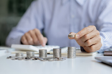 Stacks of coins arranged in a row from low to high, analogous to the growth of money, investing in stocks, stock market chart graphics showing stock trading. The idea of investing money.