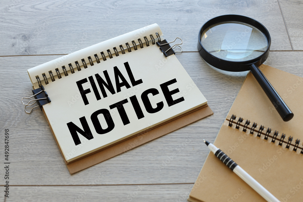 Poster final notice. text on a notepad on a light background